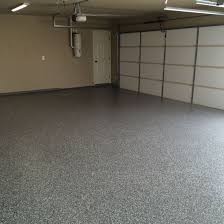 Silver Epoxy Base With Asphalt Flakes Topped Off With A Poly Aspartic Coating Flooring Working Area Tile Floor