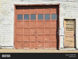 Most of our faux wooden garage doors look very realistic. Old Wooden Garage Door Image Photo Free Trial Bigstock