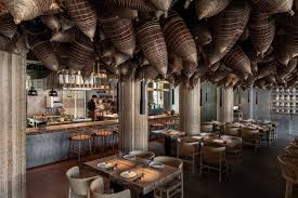 A versatile style, it's designed for comfort with contoured solid wood seats. Spicy Nospicy Restaurant Bar Kiev Ukraine Yod Design Lab Urdesignmag