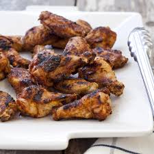Once the temperature has stabilized a bit, spread the coals out just a little and position the wings on the indirect side of the grill. The Secret To Getting Crispy Chicken Wings On The Grill
