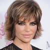 Lisa's short hair is designed to enhance the lisa rinna has gone shorter than ever before to attend the 66th annual directors guild of america awards. 1