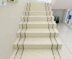 The staircase is designed using metal and the space between one stair to another is closer the colour of the tiles and the design used in the staircase design below is quite unique and fabulous. Stairs Tiles Design For Home
