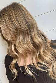 The haircut has long layers and angles around her face to compliment her face. Wheat Blonde Hair Colour Trend Popsugar Beauty Uk