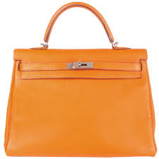 One of the most desired clutches in the hermès. Hermes Kelly 35 Retourne Potiron Clemence