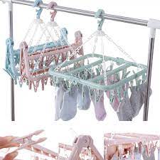It has space for 2 machine loads of laundry. Plastic Folding Clothes Hanger Towels Socks Bras Underwear Drying Rack With 32 Clips Space Saving Buy At A Low Prices On Joom E Commerce Platform