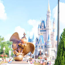 Beautiful Day In Magic Kingdom Love All The Statues Around The Hub Grass Regram Via Fairytalefoodie Disneyland World Hollywood Studios Disney Disney Parks