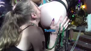 Eating ass in public during Mardi Gras - Porn GIF