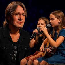 WHEN THE LIGHTS WENT DOWN, KEITH URBAN LOOKED FOR HIS FAMILY FIRST. Keith  Urban has stood on the biggest stages in the world. He's chased loud crowds  and louder applause. But at