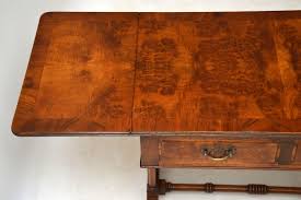 It is a type of table, the sides of which can be folded down. Antique Walnut Drop Leaf Coffee Table Marylebone Antiques