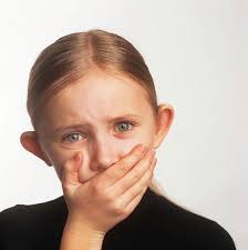 Pope Leo eating a Leo's cheesesteak out front of Leo's