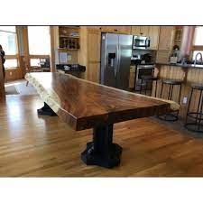 Doğal masif meşe panel masa tablası, üzerine çocuk sağlığına uygun doğal ahşap yağı i̇le renklendirme uygulanmıştır. Ceviz 8 Kisilik Yemek Masasi 01