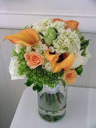 A greenery bouquet of various kinds of pale greenery and herbs with a copper leather wrapping for a modern bride. Cut Flowers Wikipedia