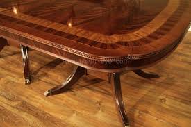 The tables you see here seat anywhere from 5 people to 8 people, with extensions that can seat an additional 12 people, allowing you to seat up to 14 people or more. Large 13 Foot Mahogany Dining Table Seats 16 People