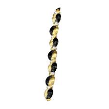 The stamp on your bracelet 750 indicates that it is 18 karat gold that is about 75% pure gold. 18k Gold Black Onyx Gold Diamond Bracelet More Bracelets Bracelets Jewelry Scullyandscully Com