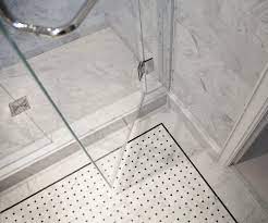 Bathroom tiles are an easy way to update your bathroom without completely renovating the whole room. Shower Floor Tile Wrapping Bathroom Interior In Chic Layouts Homedecorite