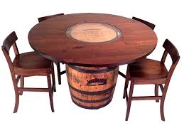 The table sits on 5 metal casters, and cast iron pipes make the handles that extend 2.5 on each end. Jack Daniels Barrel Table And Bar Stools 5 Pc Set Stewart Roth Furniture