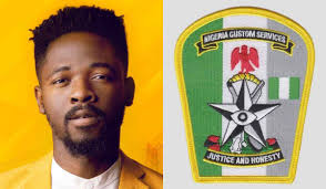 Captioning the photos, she wrote; Johnny Drille Cries Out As Nigeria Customs Ask Him To Pay N120k To Claim His N70k Clothings
