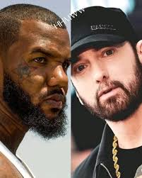 I am not saying I want smoke with Eminem , I am saying I want smoke with  Emienem, him and him... Whoever" The Game keeps it 100 and challenges  Eminem and anyone