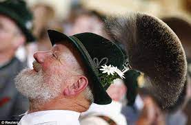 Top Hat The Bizarre Gamsbart Olympics In Germany Where Men Parade Around With 1 600 Plumes Of Goat Hair On Their Heads Hats Men Dress Hair Wear