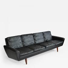Only 1 available and it's in 1 person's cart. Danish Leather Sofa With Rosewood Legs
