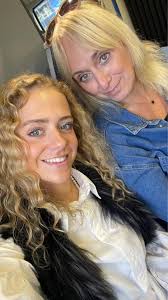 My grandfather's wallpaper store at 3233 Harrison Ave. in Cheviot. On the  steps are my uncle and aunt Joe and Mabel Dirr. Mabel was born in 1907 so  I'm guessing this pic