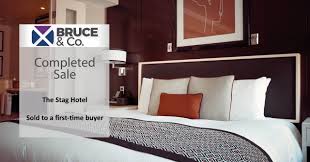 Snug guest room with a fire place The Stag Hotel Sold By Bruce Co Altius Group