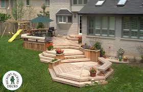 This 12' x 12' deck is a single week job. 25 Multi Level Deck Design Ideas For Exciting Parties Outdoor Living Deck Multi Level Deck Cedar Deck