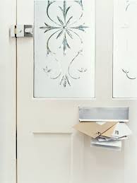 This front door arrangement shows off a variety of decorating options. 12 Surprising Design Uses For Window Film And Appliques This Old House