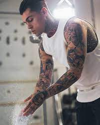 A ship stands still amidst all the turbulence of the sea. Mens Tattoos Ideas Shoulder Galleries Alpha Emul Fashion