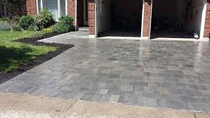We originally planned to lay the patio on a gravel and sand bed with the joints filled with sand. Ensuring The Longevity Of Your Interlocking Driveway And Patio Choosing The Right Sand During Installation Markstone Landscaping