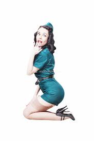 You can also go for this 'do if sleek hairstyles aren't. Portrait Of Cute Sexy Brunette With Black Hair Pin Up Female Dressed In Military Clothing Uniform And Garrison Cap Army Pin Up Girl Concept Backgrounds Textures Indivstock