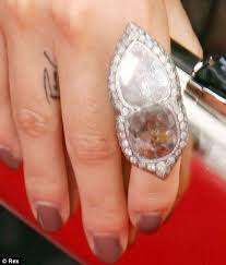 Tattoo on her right knee. Say It With Ink Twilight S Nikki Reed Gets Fiance American Idol Star Paul Mcdonald S Name Tattooed Between Her Fingers Finger Tattoos Nikki Reed Mcdonalds Tattoo