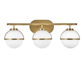 This stylish modern brushed gold and white glass lighting fixture makes the perfect choice for your bath or vanity with its damp location and energy star rating features: Hinkley Hollis 3 Light Led Bathroom Vanity Light In Heritage Brass Lightsonline Com