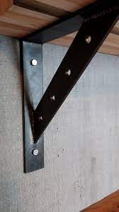 Simply assemble multiple brackets using screws, bolts, or nails (sold separately). Eleventy Industrial Style Metal Shelving Brackets Heavy Duty Modern 9 X9 Metal Shelves Metal Shelf Brackets Industrial Wall Decor