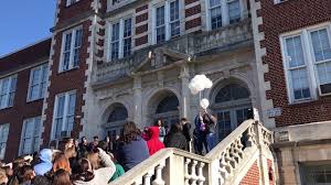 Students sing during walkout at CSAS