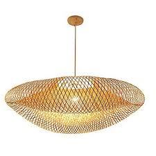 Linge de lit en lin, tabouret en bois, fauteuil en rotin, suspension en osier… et nous, on est plutôt pour ! La Meilleure Suspension En Rotin Zone Led