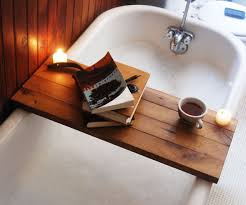 Simply add your select items onto the bath caddy tray and place it on the edges of the bathtub. Wooden Bathtub Caddy