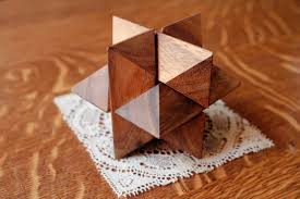 Containing 6 intricately cut pieces of different shaped pieces; 3d Wooden Puzzle Brain Teaser Solution