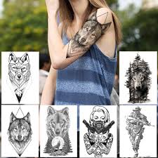 Some prefer simplistic or geometric designs, while some others might prefer their wolf tattoos to be as real as possible. Geometrische Raute Wolf Tattoos Temporare Schwarz Henna Tattoo Aufkleber Fur Manner Frauen Soldat Krieger Korper Kunst Arm Bein Tatoo Papier Temporary Tattoos Aliexpress