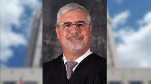 Who is Orange-Osceola Judge Jeff Ashton?