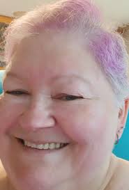 Empowered woman rises from difficult past