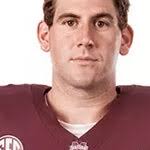 Jett Johnson presents NIL check to Tupelo football