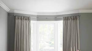 For this option, judith adds, take accurate measurements and bend the track on site then fit with brackets. Neo Bay Window Curtain Poles Heavyweight Eyelet Curtains