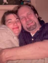 Dan Miller, grandson Peter Earley, granddaughter Diana Earley and Mr. Durgy  driving the wagon.