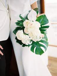 We can help you select your wedding flowers, from the bouquet and bridesmaids flowers to the guest tables. Pin By Rosy Covarrubias On Things I Love Tropical Wedding Bouquets Hawaii Wedding Hawaiian Wedding