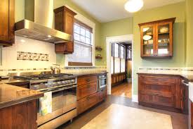 Next, we modified the hanging cabinet over the stove to accommodate a combination microwave and vent hood by cutting the existing face frame on the cabinet and removing the cabinet bottom. A 60s Kitchen Gets With The Times Strite Design Remodel