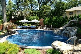 Backyard oasis is your one stop swimming pool company. Small Sloping Backyard Fits Beautiful Oasis Long Island Ny Pool New York By Deck And Patio Company Outdoor Living Experts Houzz