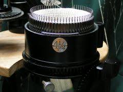 A cam carries the latch needles up. Knitting Machine On Sale