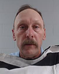 Johnson County Sheriff Adam King charged with abuse of office, sexual  harassment