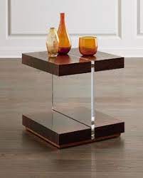 With a lava stone top contrasting against its airy, stainless steel base, our ashton coffee table brings style and function both indoors and out. John Richard Collection Ashton Gate Side Table Side Table Unique End Tables John Richard Collection